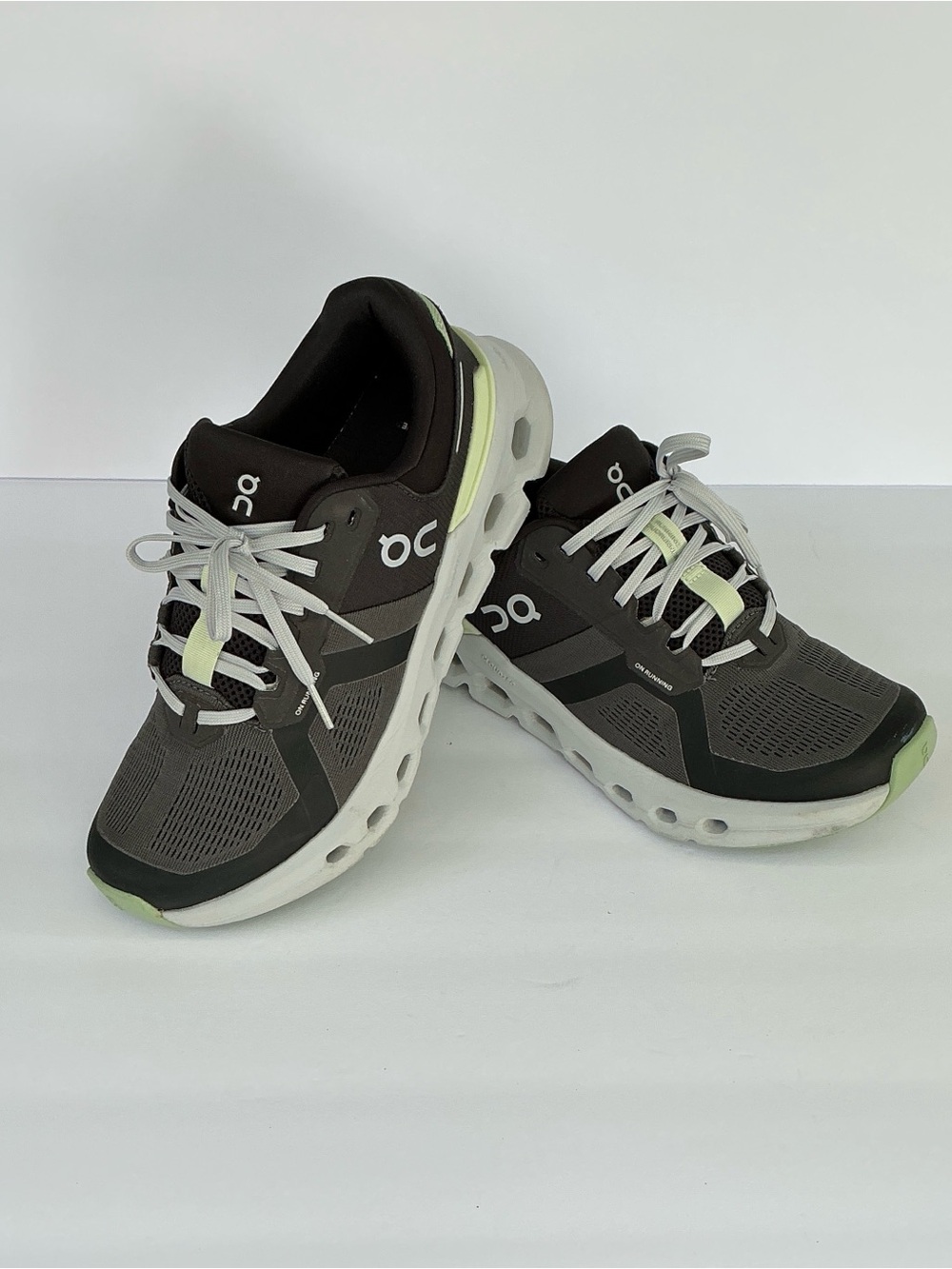 On Running Women's Sneakers in Dark Gray with Light Green Accents